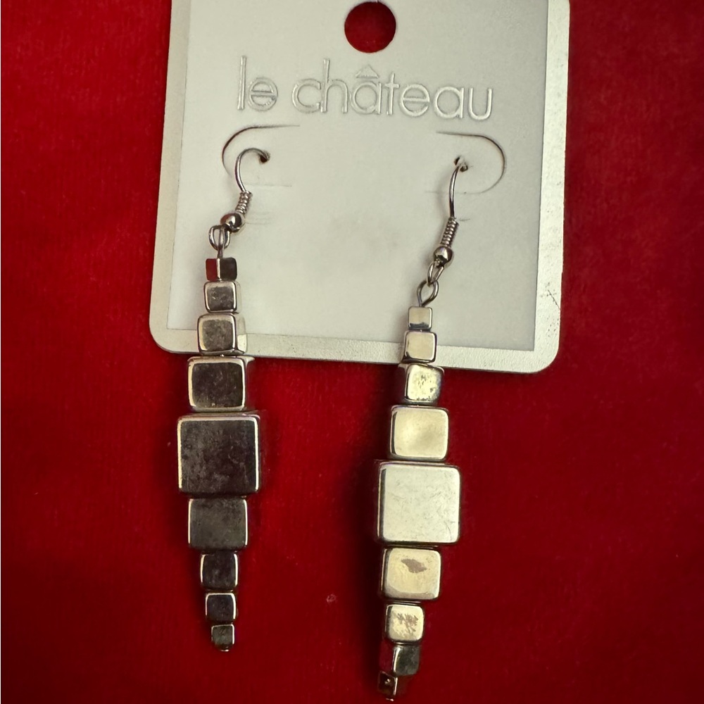 Brand new Le chateau silver toned earrings